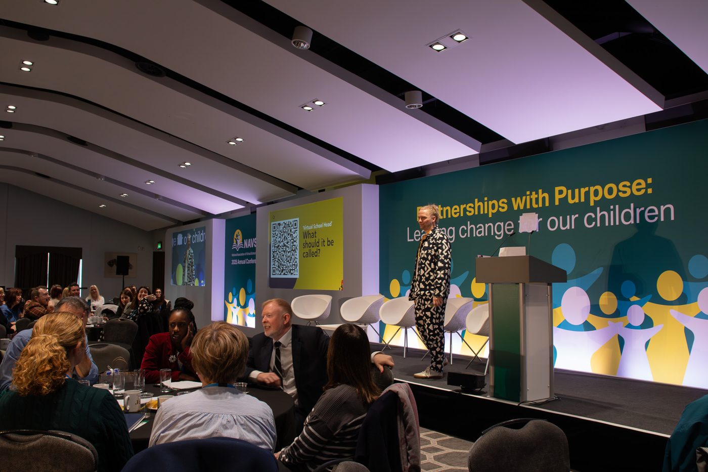 Luke on the main stage at the NAVSH annual conference 2025