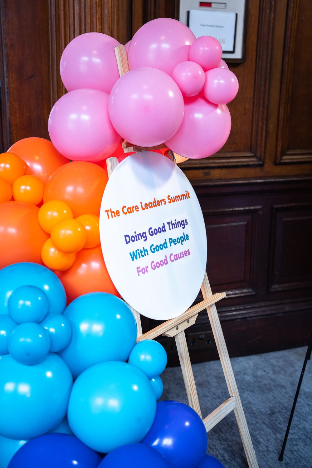 Balloons and a welcome sign for The Care Leaders Summit